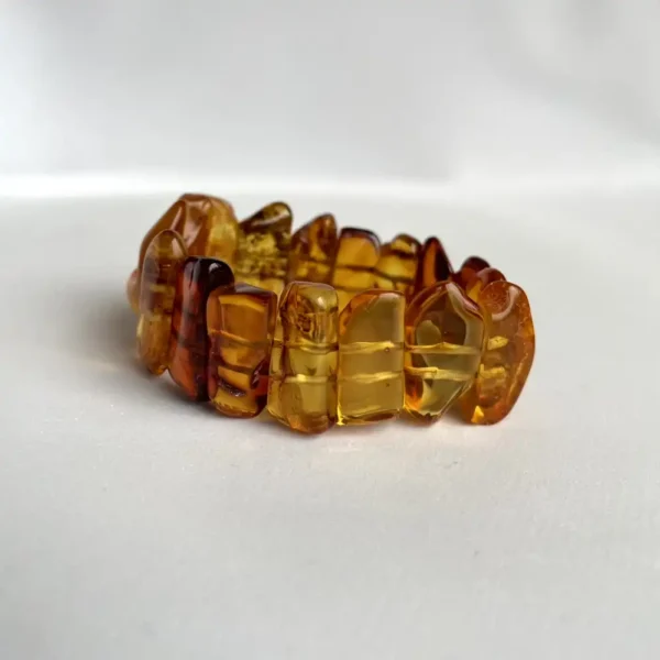 Stunning amber bead bracelet showcasing natural hues and unique textures, perfect for any occasion.