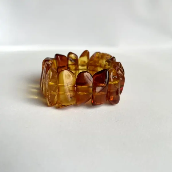 Elegant amber bracelet showcasing translucent stones in warm hues, perfect for any occasion.