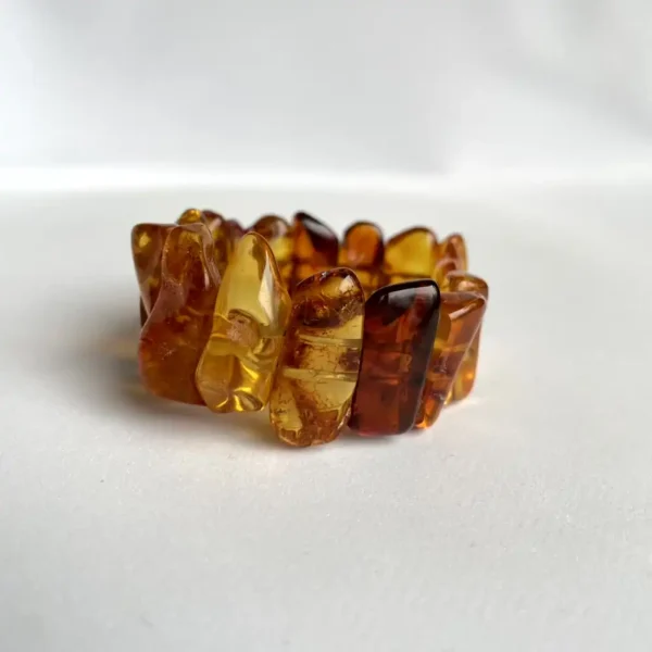 Unique amber bracelet featuring handcrafted beads in warm hues and organic shapes.