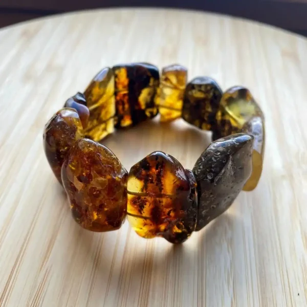 Unique amber bracelet with irregular beads showcasing natural beauty and rich, warm hues.