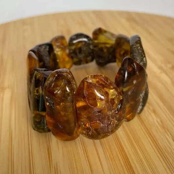 Stunning amber bracelet featuring unique, natural stones with various hues and textures.