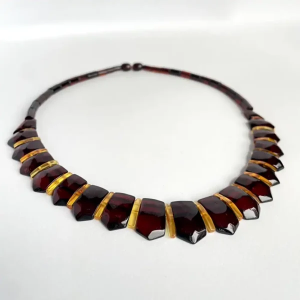 Elegant geometric brown and amber necklace with polished finish for timeless style.