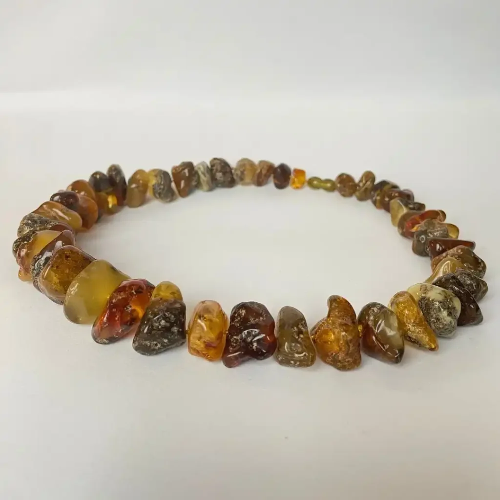 Beautiful amber bead necklace showcasing unique polished stones in warm, natural hues.