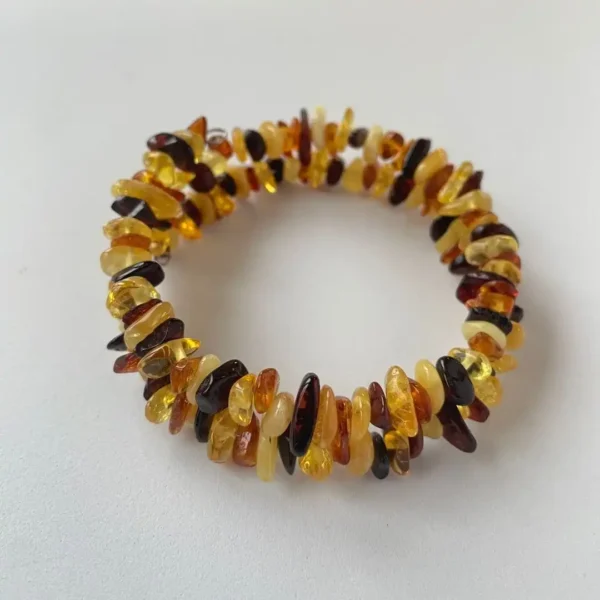 Polished amber bead bracelet showcasing vibrant colors and natural elegance for stylish jewelry lovers.