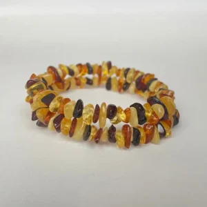 Stunning amber bracelet with natural beads in vibrant hues for a fashionable accessory.