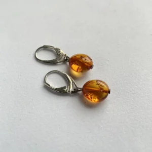 Elegant amber earrings with silver lever-back hooks, perfect for any occasion.