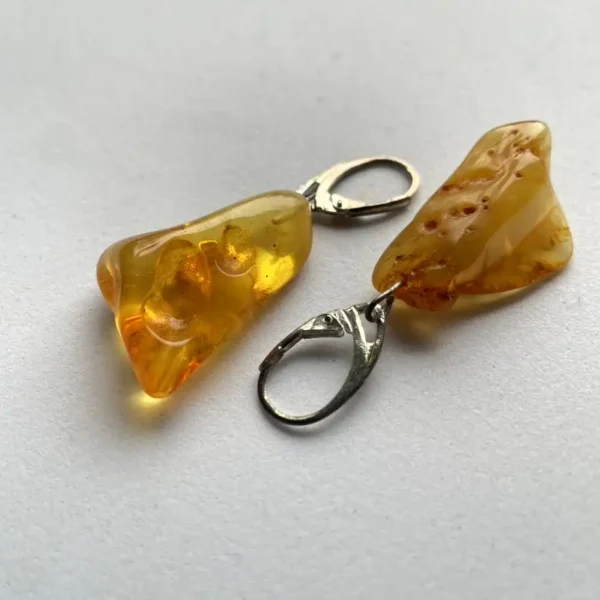 Elegant amber pendants, showcasing natural beauty and unique craftsmanship.