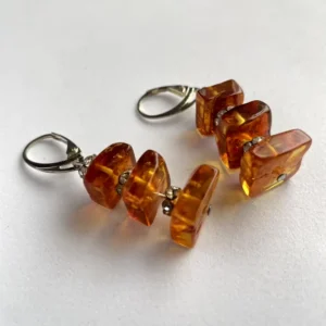 Elegant amber resin earrings for a stunning accessory choice.