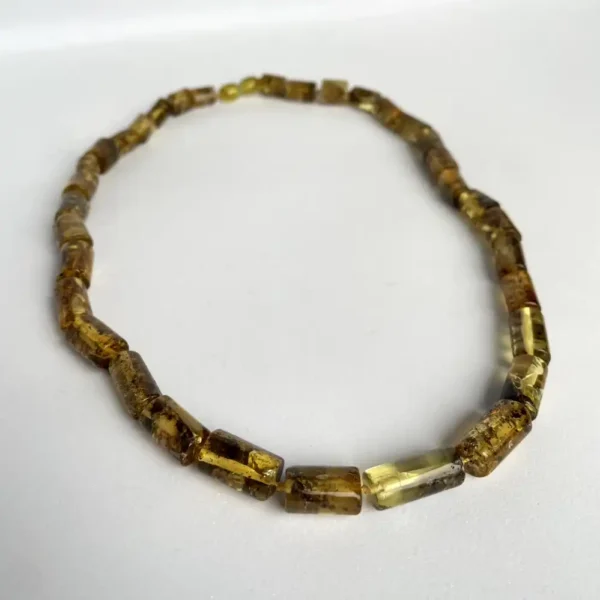 Stunning amber bead necklace showcasing unique shapes, warm hues, and exquisite craftsmanship.