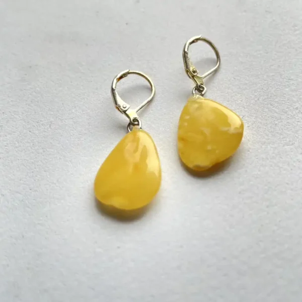 Vibrant yellow teardrop earrings, perfect for adding a cheerful touch.