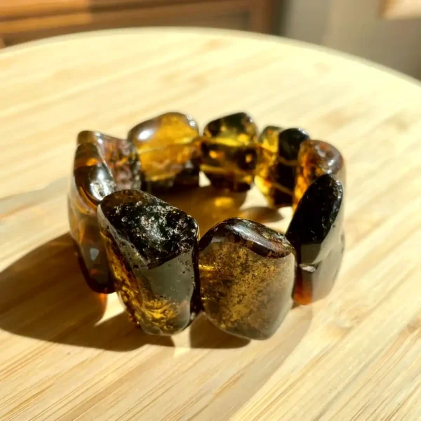 Beautiful amber bracelet with unique beads showcasing warm hues and natural textures.