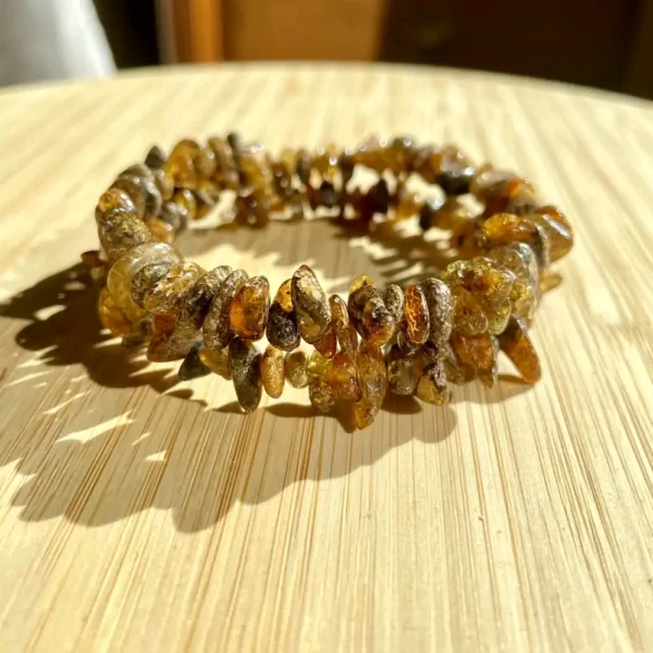 Stunning amber bracelet featuring polished stones, showcasing natural elegance and unique inclusions.