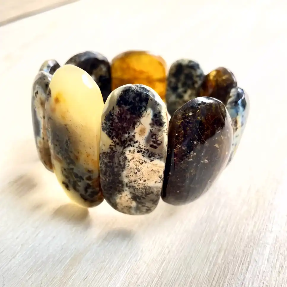 Stunning Amber Bracelet with Large Stones showcasing unique colors and organic shapes in handcrafted jewelry.